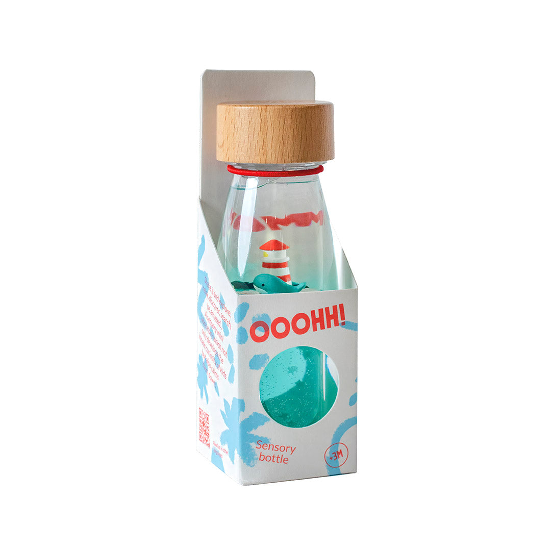 Sensorische fles walvis en vuurtoren
