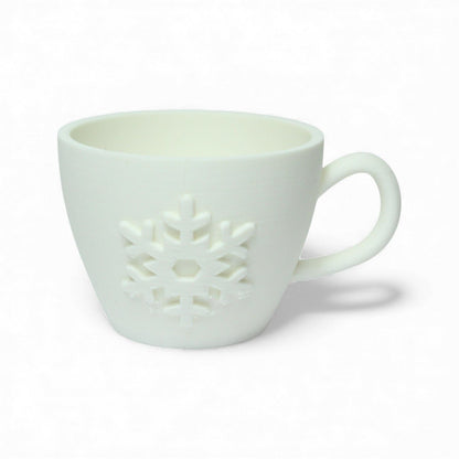 Koffiekop met sneeuwvlok