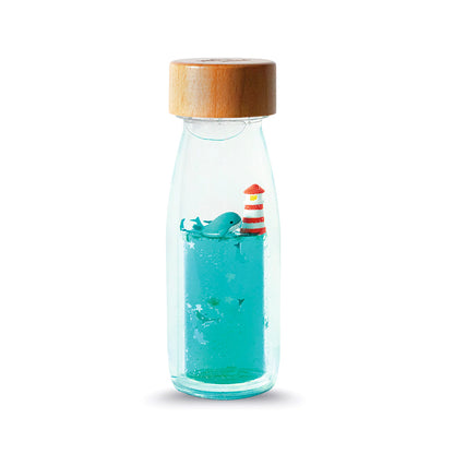 Sensorische fles walvis en vuurtoren